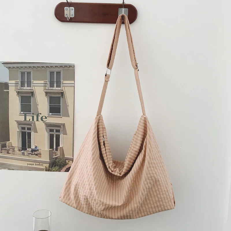 

Japanese Style Versatile Crossbody Bag for Women, Large Capacity Commuter Shopping Bag, Simple Lightweight Shoulder Bag, New Stu