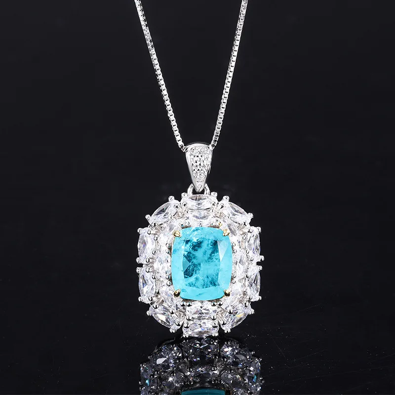 

New fashion trend S925 silver inlaid 5A zircon wood with emerald green color separation pendant ring set