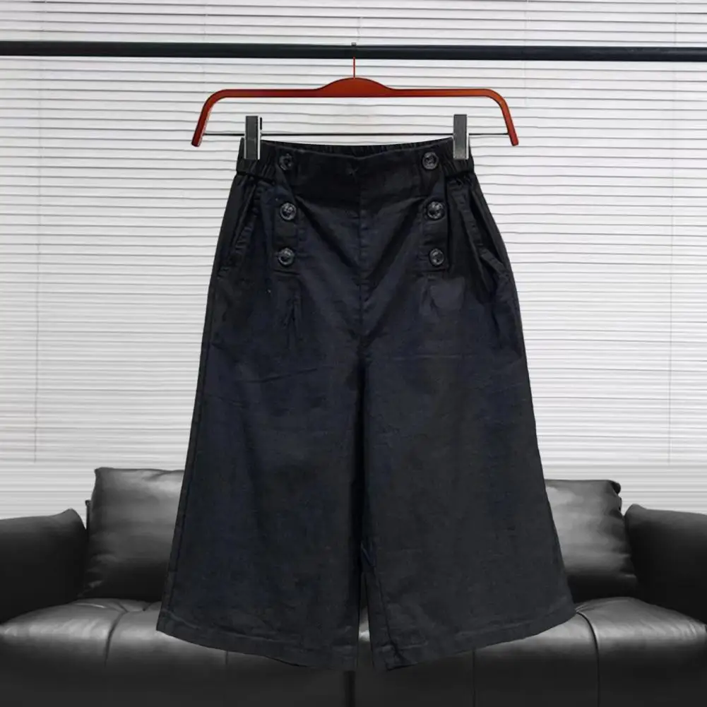 여성의 유행 단색 단추 주머니 느슨한 자른 바지 느슨하고 편안한 캐주얼 하렘 바지