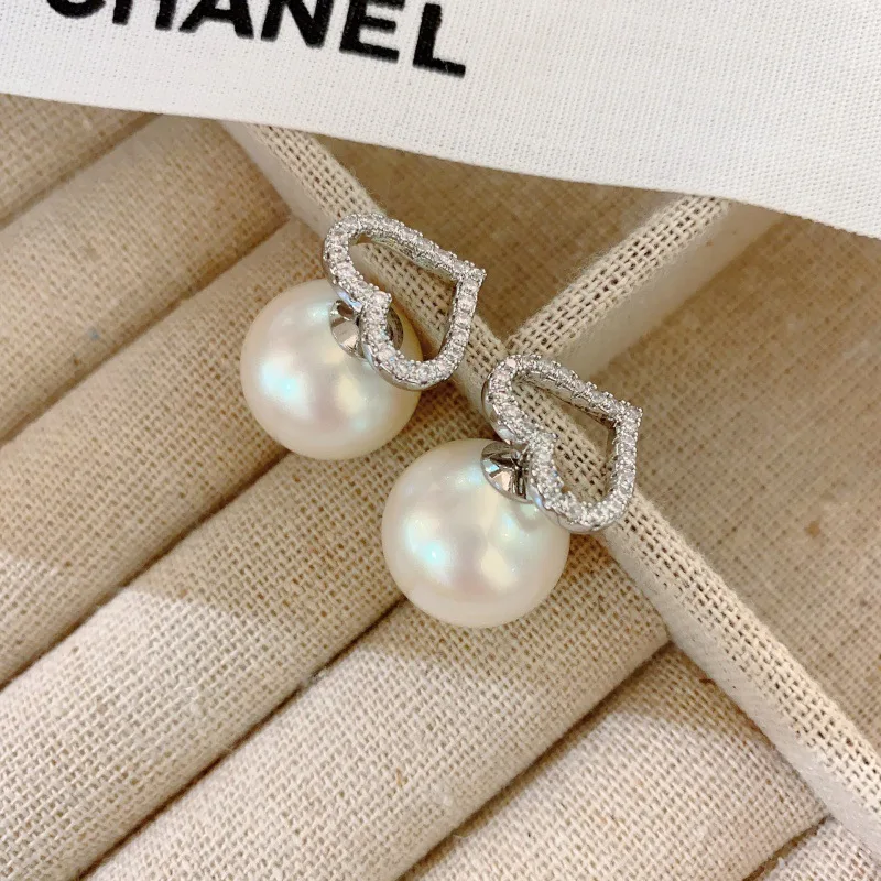A two-wear upgraded version of niche design Korean love back buckle pearl full of diamonds super flash gentle celebrity earrings