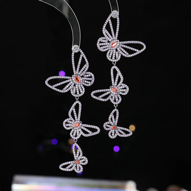 

Heavy Industry's new dynamic hollowed-out butterfly earrings, light luxury micro-inlaid zircon niche s925 silver needle earrings