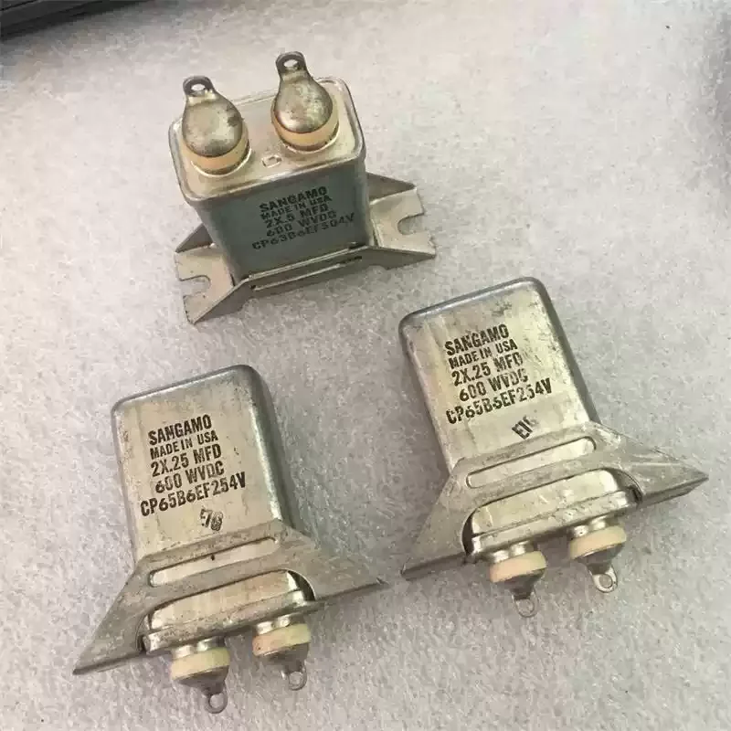 

Антикварный американский SANGAMO 2 × 0,25 мкФ поколения 0,22 мкФ 600 В с двойным подключением, машина для желчного пузыря, соединенный масляный конденсатор