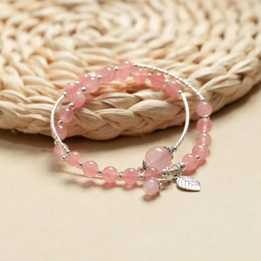 

Double Circle Bracelet With Leaf Pendant