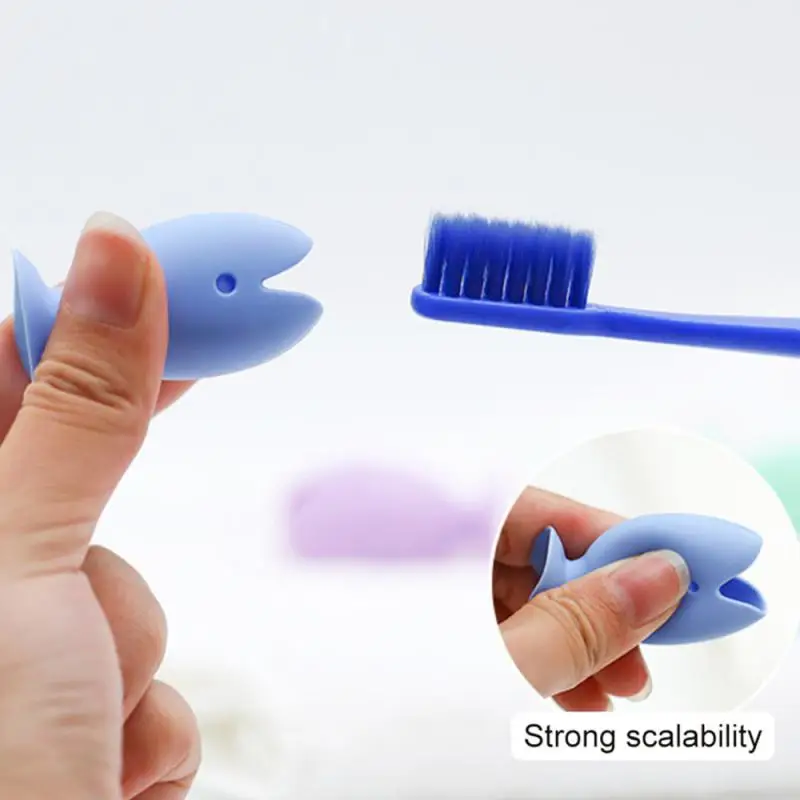 Supporto per spazzolino da denti supporto per spazzolino da denti in Silicone a forma di pesce carino portaspazzolino da viaggio portatile tappi per spazzolino da denti prodotto per il bagno