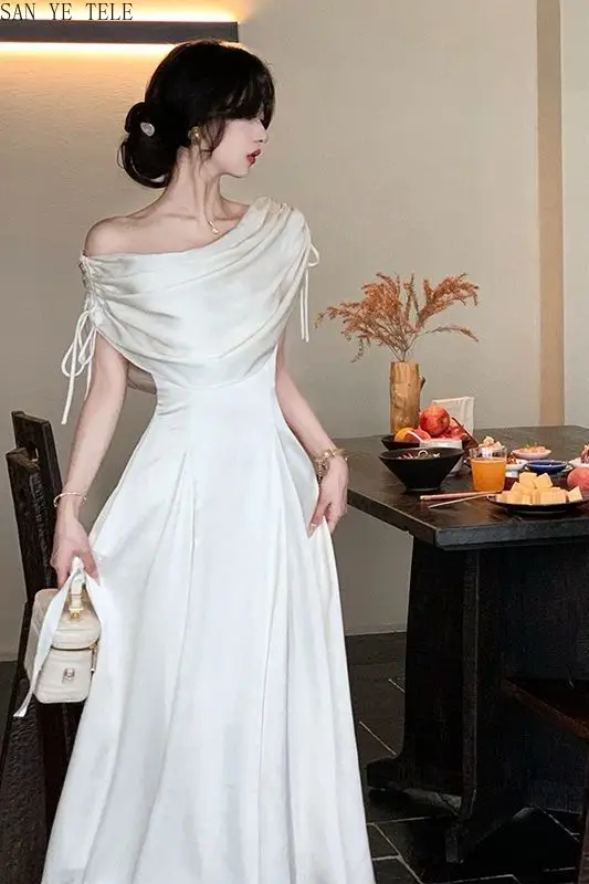 Robe longue élégante style Hepburn pour femme, nouvelle collection été, taille haute, coupe trapèze, manches courtes, asymétrique à une épaule, amincissante