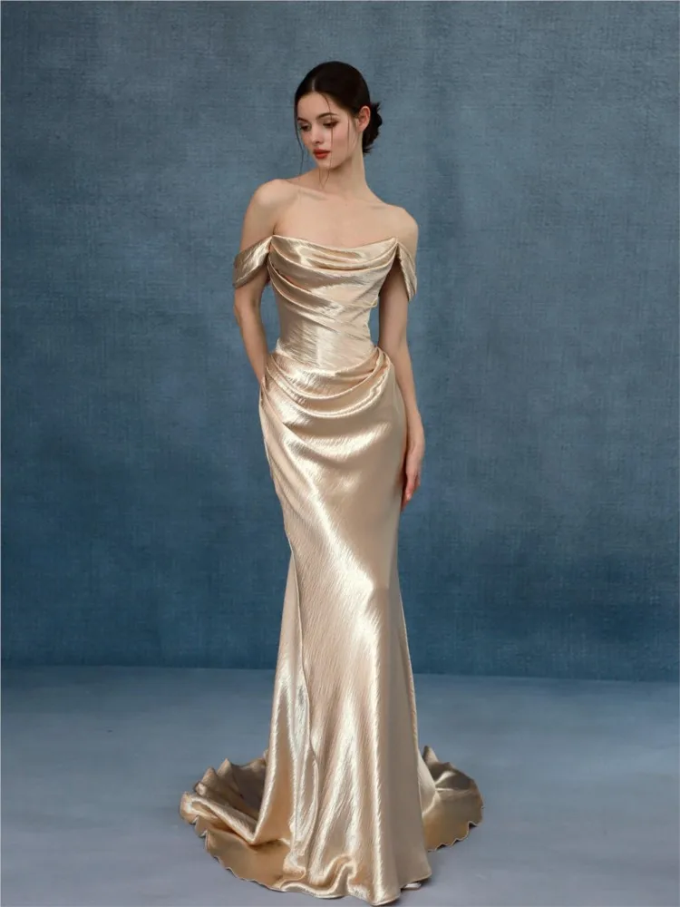 Champagne gold fishtail evening gown and toasting skirt