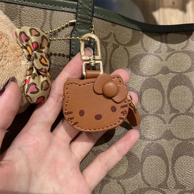 ハローキティ ミニバッグ キーホルダー かわいいカウボーイ ペンダント ゴールデンクラスプ付き 理想的なファッションアクセサリー グッズ 財布 誕生日ギフト