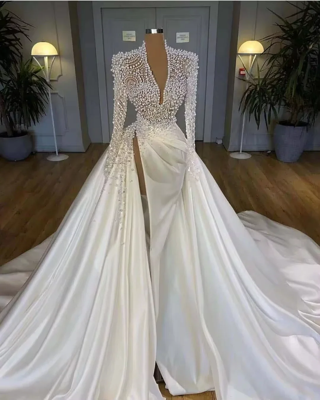 

Customized Pearls Beaded Mermaid Wedding Dresses with Overskirt High Split Deep V Neck Long Sleeves Satin Ruched Pleats