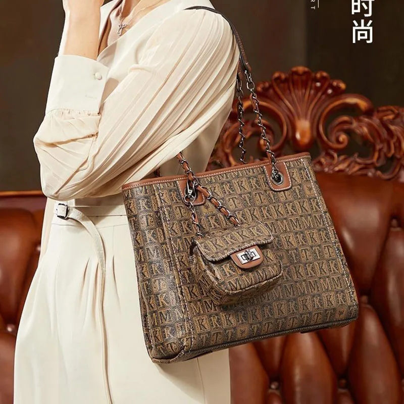 

Independent brand 2024 designer new high-grade texture Tote large bag women's large capacity chain hand bill shoulder bag M332