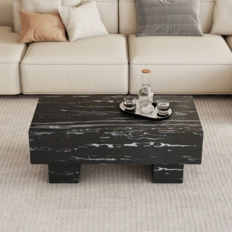 The black coffee table has patterns. Modern rectangular table, suitable for living rooms and apartments.