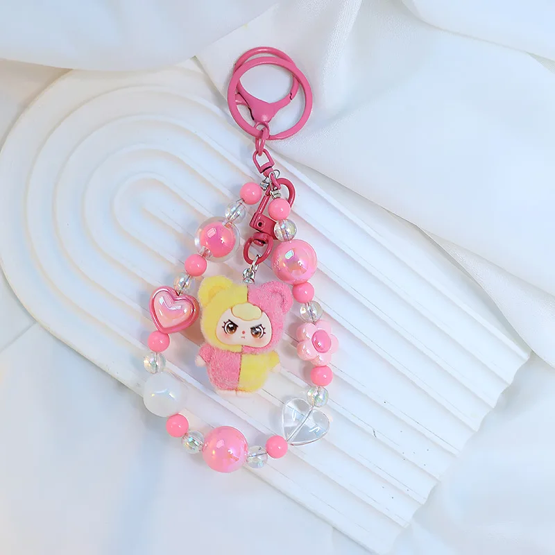 

A three-year-old 2D kid keychain pendant, silicone three-dimensional cute granular bag, beaded pendant, and a small gift for bes