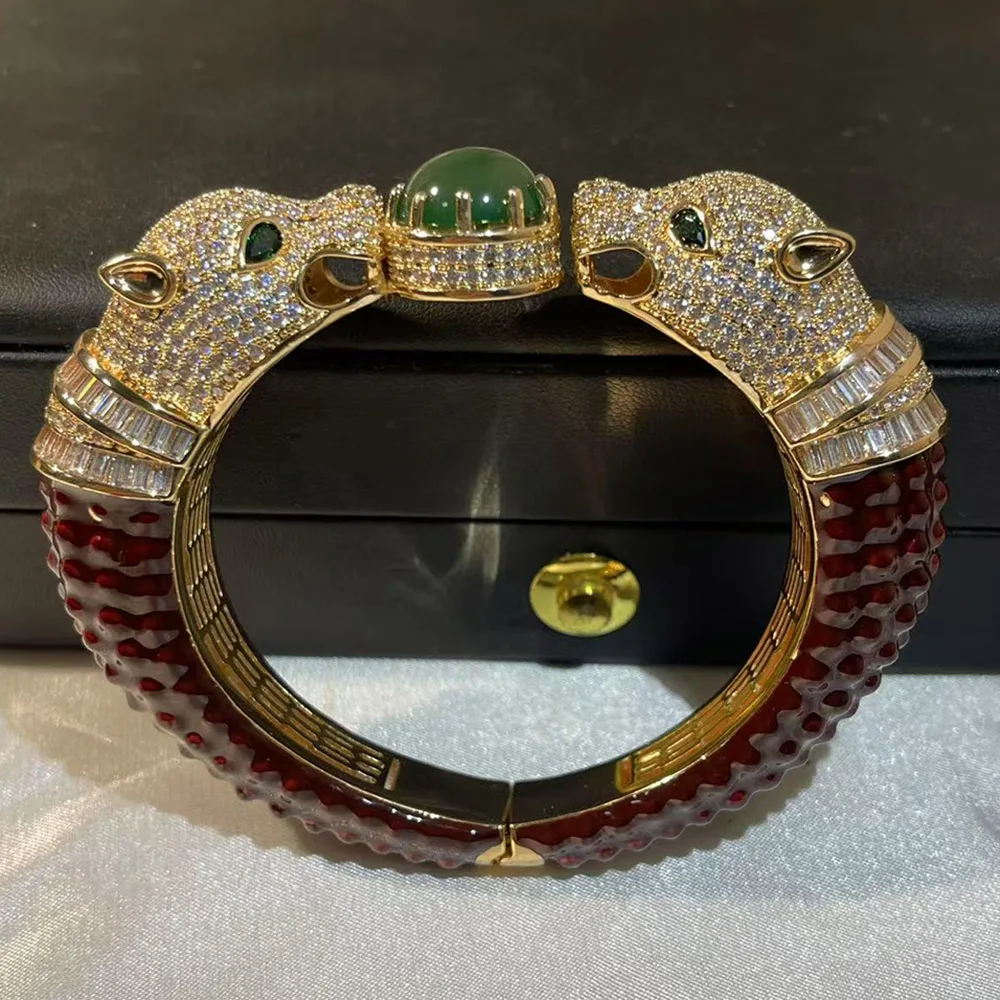 

Pulsera abierta creativa de calcedonia de leopardo bicéfala europea y americana Pulsera de estilo de corte para mujer