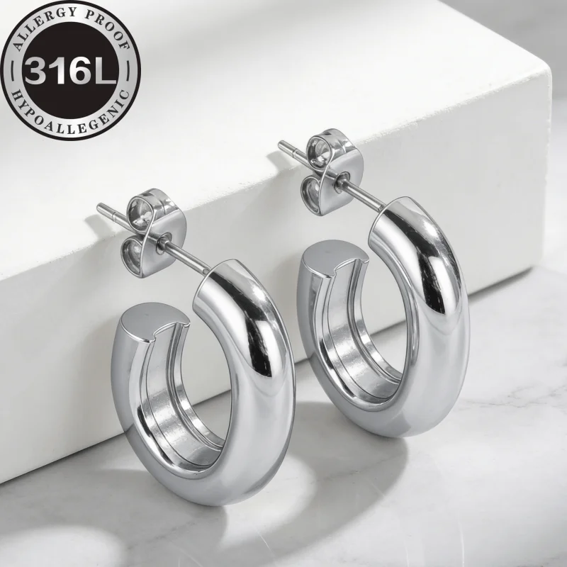 A pair of 316L stainless steel hypoallergenic, hemispherical line oval, gold and silver, anti-fading, suitable for skin-friendly