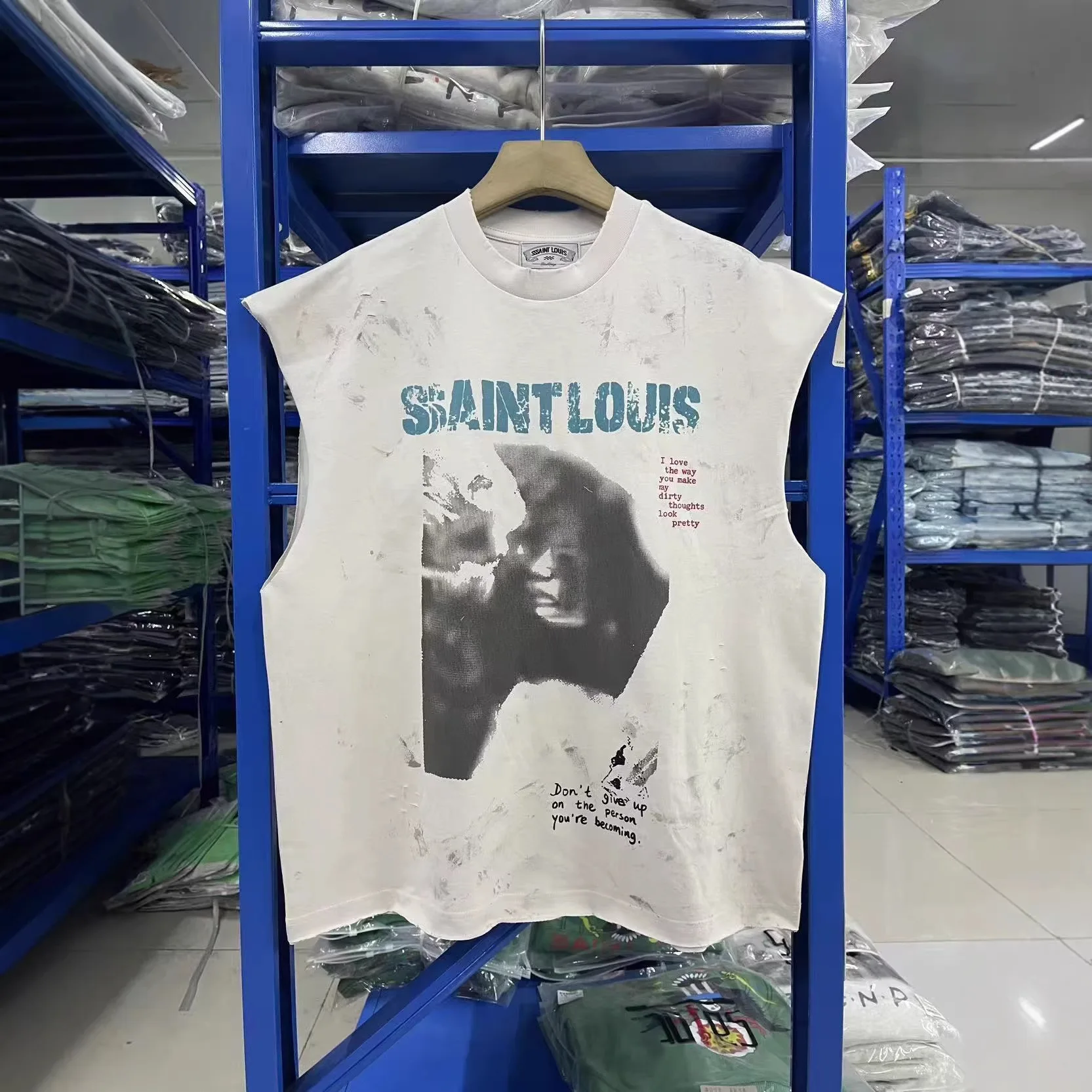 SSSAINT LOUIS American streetwear brand Blue lettering logo. Street style Washed and aged effect. Sleeveless T-shirt