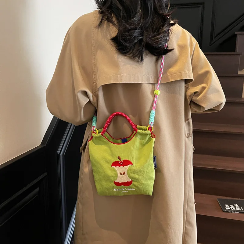 Women's Cute Apple Core Embroidery Drawstring Bag Colorful Braided Strap Mini Canvas Crossbody Bag for Daily Use