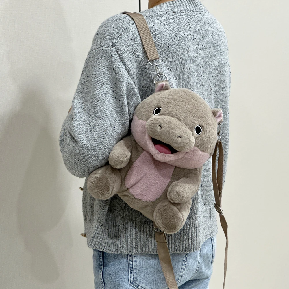 Cute gray pink pig plush backpack, essential for travel, cute creative design, warm home decoration