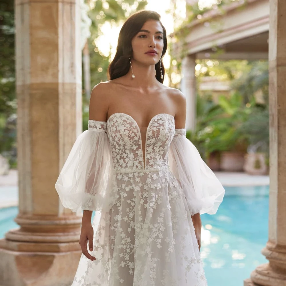 ชุดแต่งงานทรงเอไลน์ที่สง่างามสำหรับผู้หญิง ชุดเจ้าสาวลูกไม้ประดับลายโรแมนติก ชุดแต่งงานลูกไม้แขนยาวที่มีเสน่ห์ ชุดเจ้าสาวสำหรับงานแต่งงาน