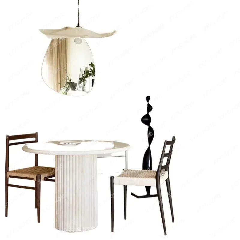 A Natural marble wabi sand travertine imported dining table living room household round light luxury high-end dining table