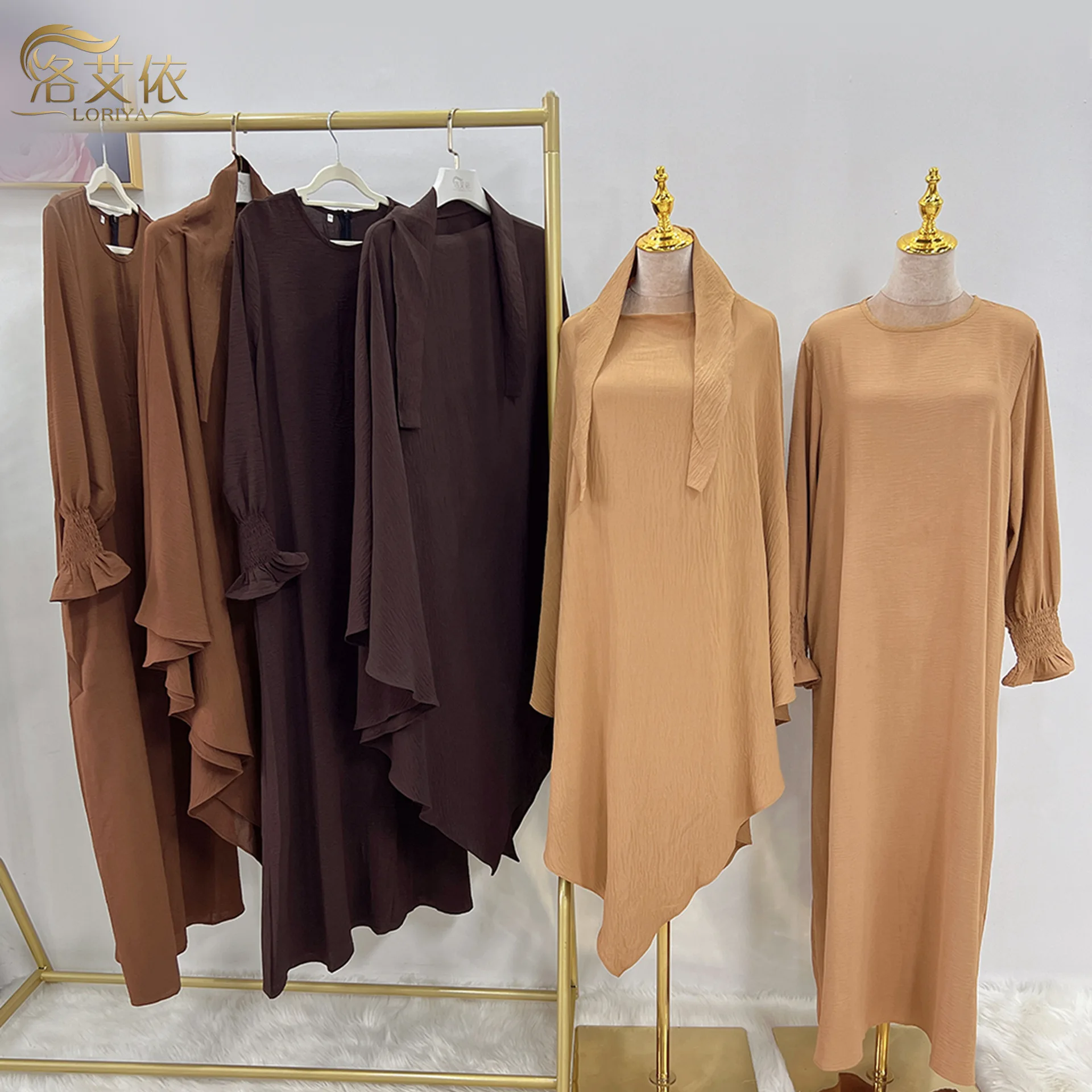 Set musulmani di alta qualità Crepe di seta del ghiaccio Khimar + Abito lungo interno Set in due pezzi Vendita calda Moda musulmana Donna Casual Jilbab Abaya