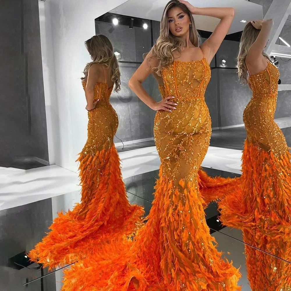 

Orange Spaghetti Strap Mermaid Evening Dresses Gowns Luxury Feathers Beaded For Women Wedding Party 2024 LA72272