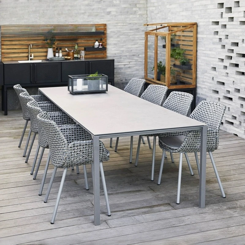 Outdoor villa table and chair combination courtyard garden slate long table leisure hotel B&B vacation metal rattan chair