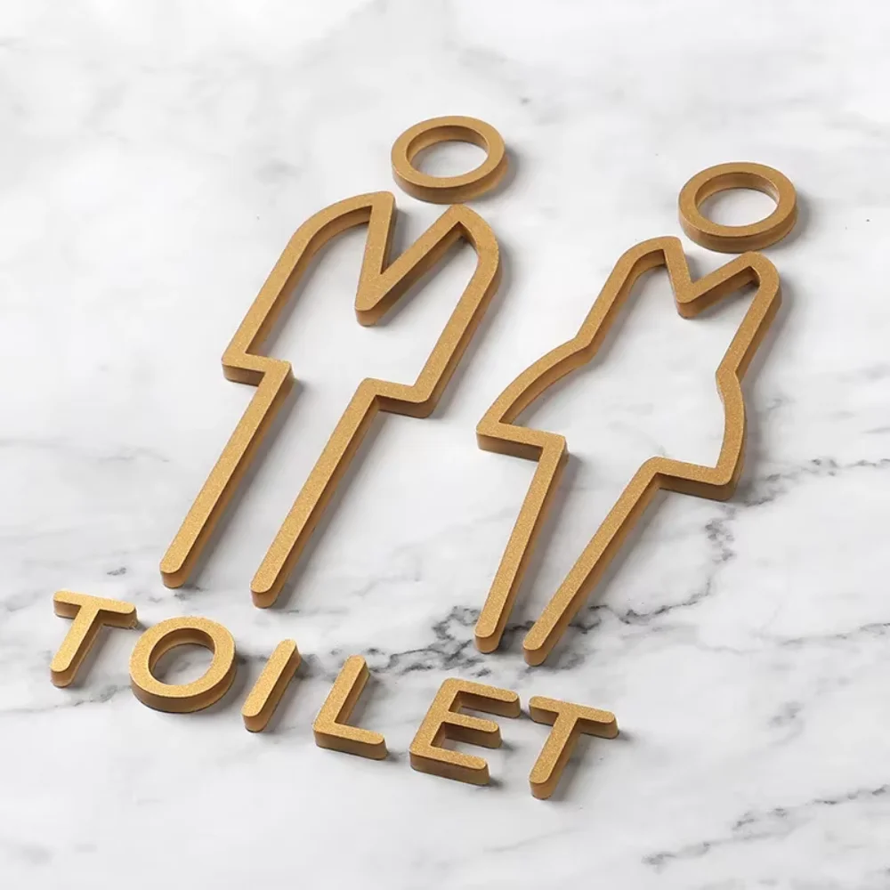 Déverrouillez le glamour d'un panneau de salle de bain en or noir en acrylique 3D parfait pour l'étiquetage mural de porte d'hôtel et de lieux publics