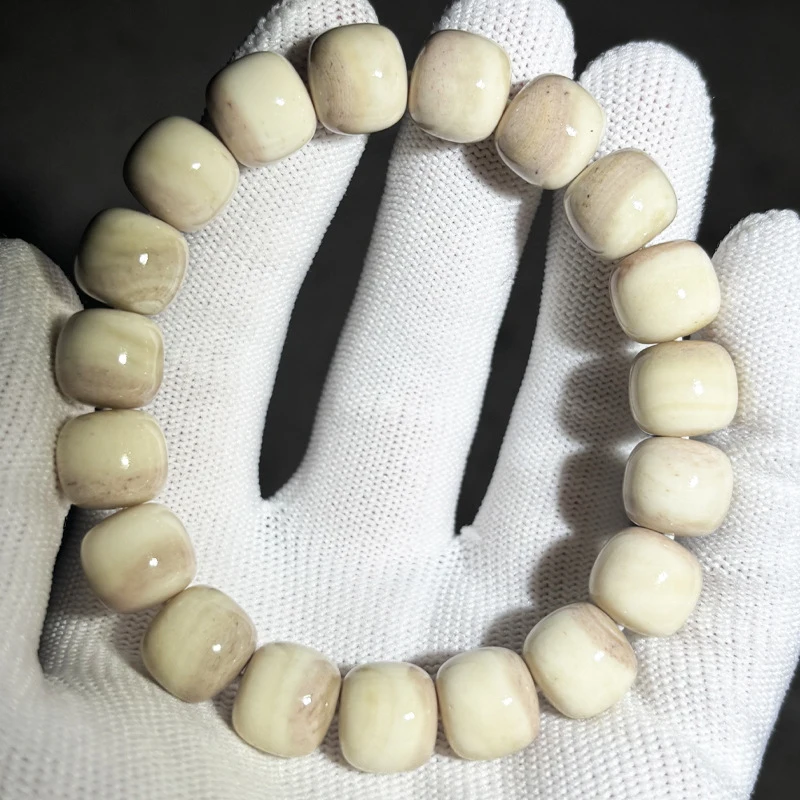 

Natural camel skull with oil content and high density, traditional fan-shaped old-style barrel beads for hand bracele