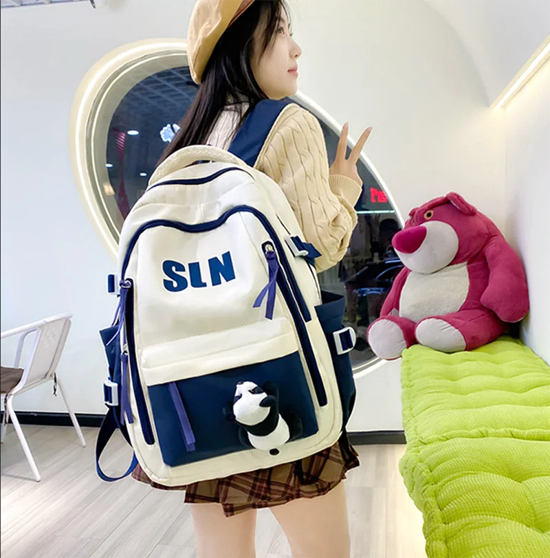 Tendencia Popular, compre uno y llévese otro gratis, colgante de Panda Oxford, bolsas de viaje versátiles de gran capacidad, mochila escolar ligera para mujeres y niñas