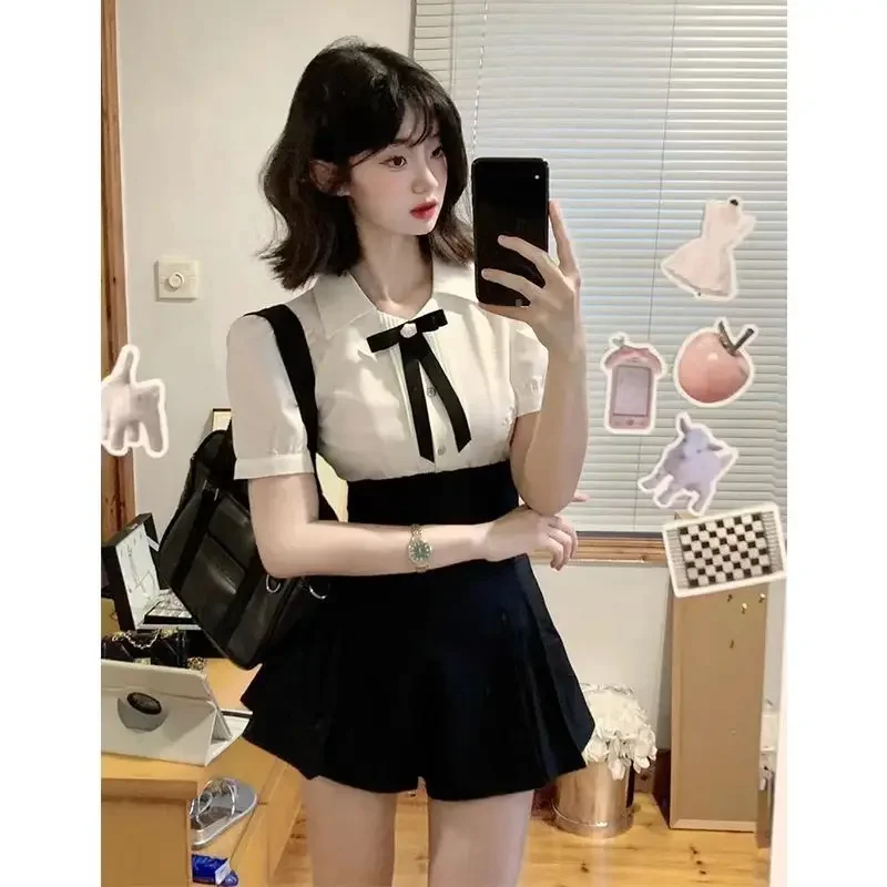 Set uniforme scolastica per ragazza calda in stile college americano Set di culottes a vita alta con fiocco superiore migliorato Set uniforme Jk quotidiano in stile giapponese coreano