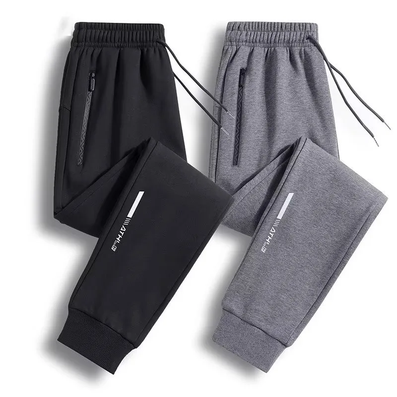 

Men Plus Size Loose Taper Leg Sports Pants Spring Autumn New Male Daily Casual Versatile Pants High Quality Solid Color Trousers