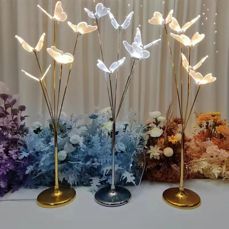 

road lead wrought iron butterflies and birds, on-site arrangement, luminous floor lights, T-table decoration hotel