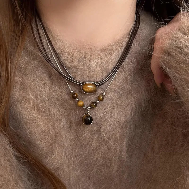 Exquisite jewelry retro leather tiger eye stone necklace women's sweater chain light luxury niche Chinese style stacking
