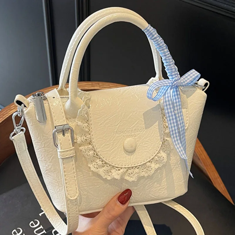 

2025 New Designer Hand Carved Shoulder Bag Stylish Textured Crossbody Purse for Women Elegant Handheld Tote Fashionable