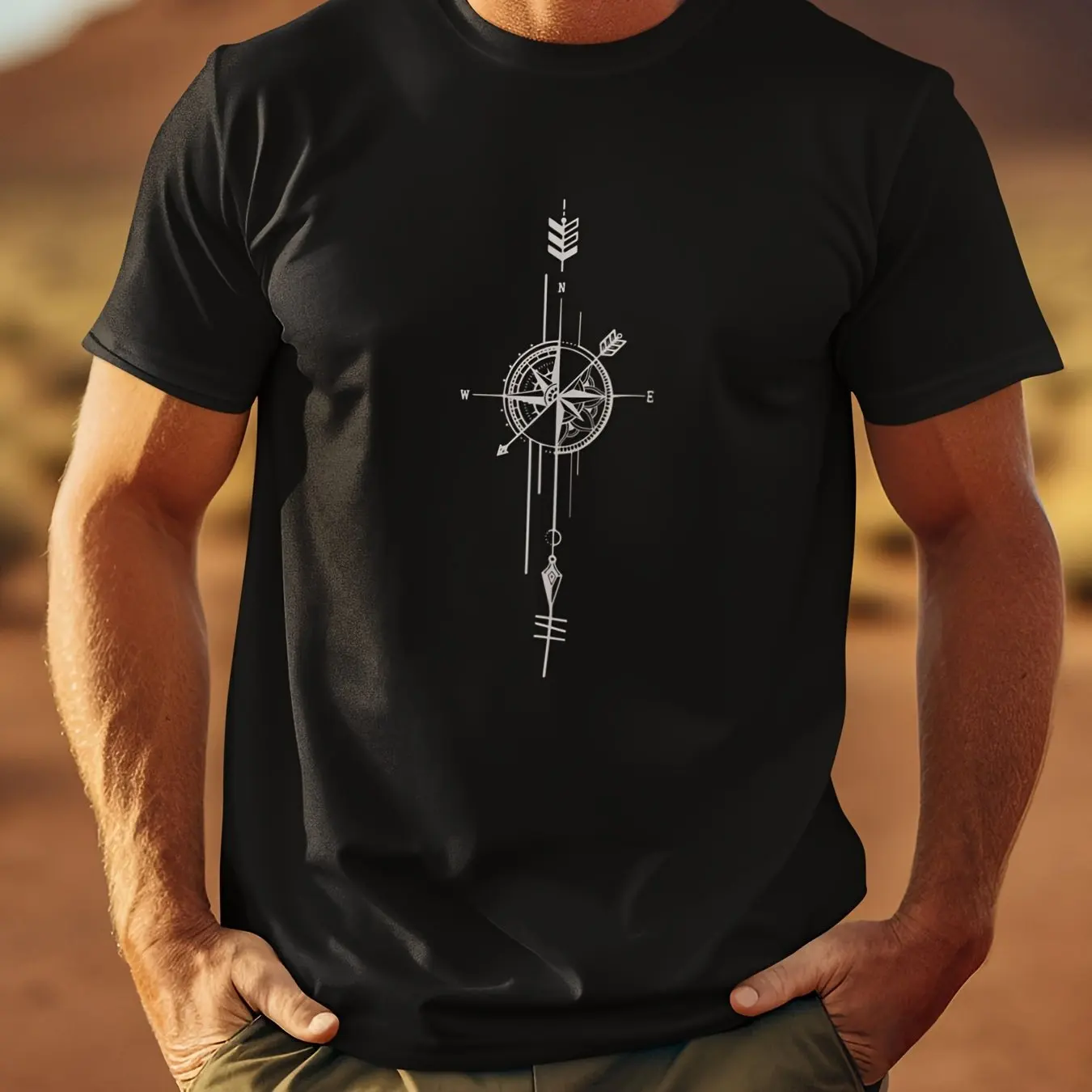 Men's black t-shirt featuring a minimalist compass and arrow graphic design made from 100% cotton for a comfortable fit