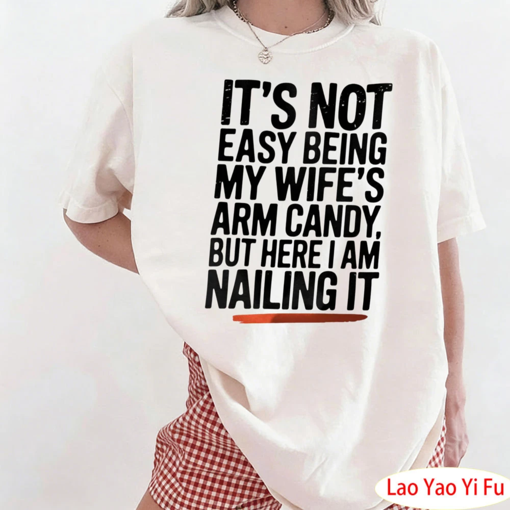 IT'S NOT EASY BEING MY WIFE'S ARM CANDY. BUT HERE LAM NAILING IT Shirt Funny Husband T-Shirt Wife's Arm Candy Design