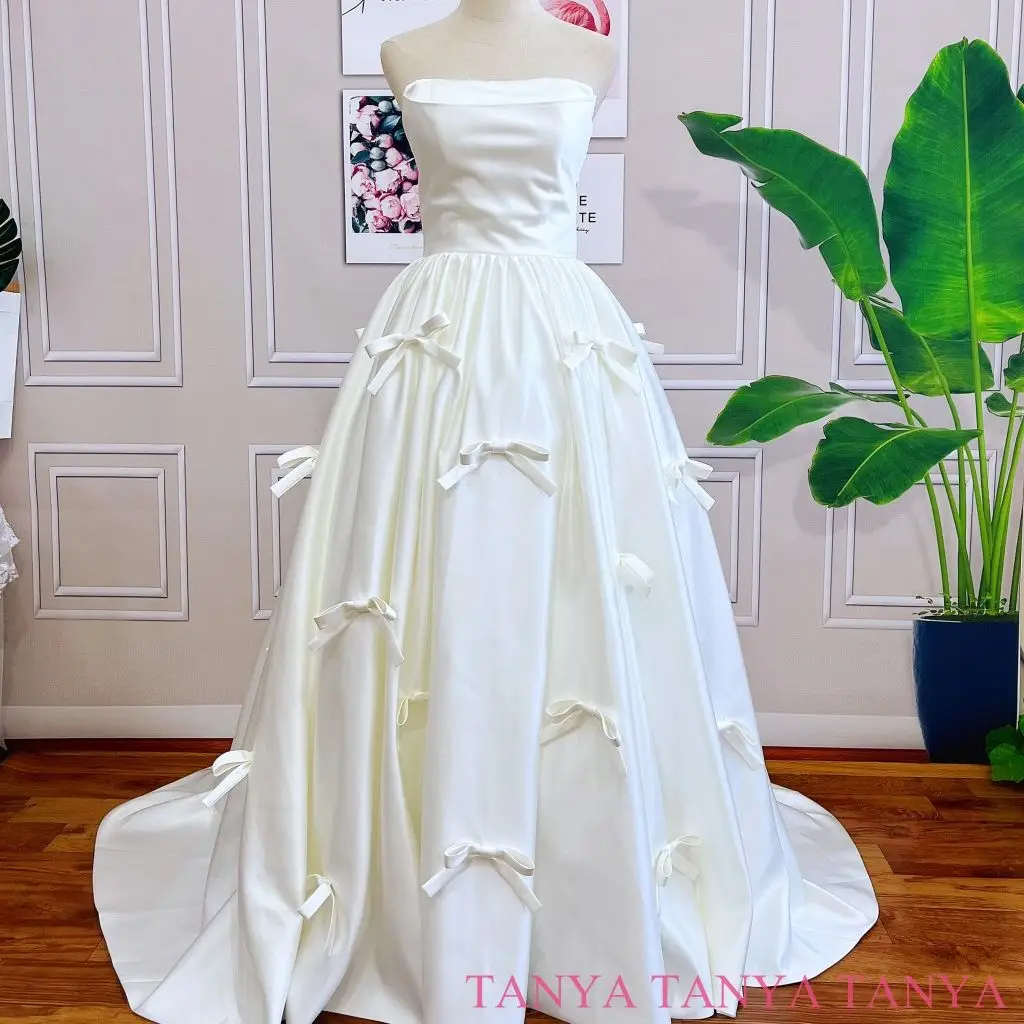 Graceful Ball Gown Wedding Dresses With Bownot Decoration Simple Strapless Sleeveless Elegant Lace Up Back Bridal Gown TT614