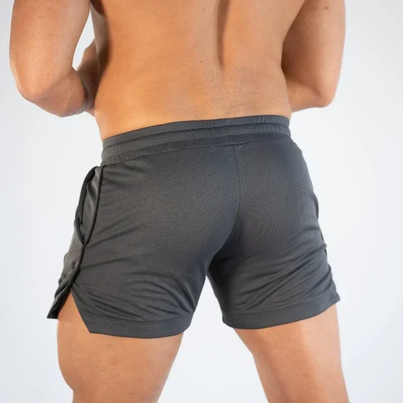 Pantalones cortos deportivos para hombre, ropa deportiva de verano para la playa, trotar, entrenamiento, talla grande, ropa de baloncesto, gimnasio, Fitness, correr