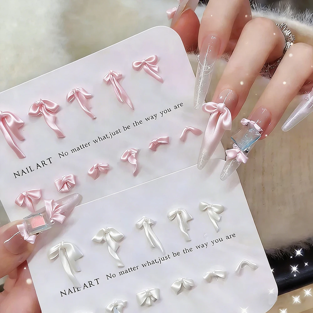 100pcs Pink+White 3D Soft Carving Pearlescent Satin Light Bowknot Nail Charms Long Ribbon Bow Nail Rhinestone Elegant Nail Decor