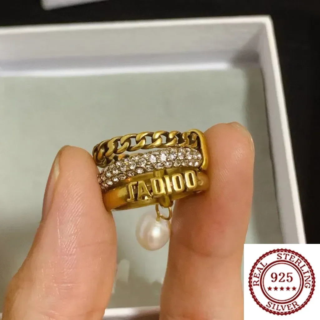 

Xiaoxiangfeng Letter Coded Pearl Ring Women's High Version Retro Diamond Inlaid Women