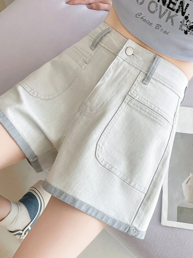 Curled denim shorts women's summer new high waisted contrasting color splicing A-line wide leg spicy girl short pants