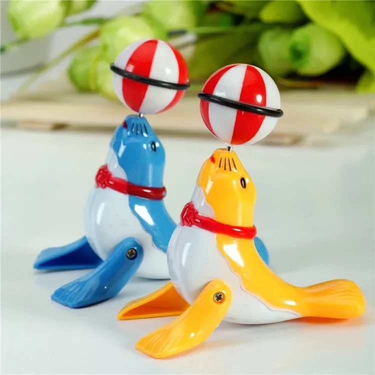 30PCS  Clockwork Dolphin Chain Top Ball Dolphin Stall Toy Sea Lion Top Ball 360 degree Rotation Walking Acrobatics Top Ball