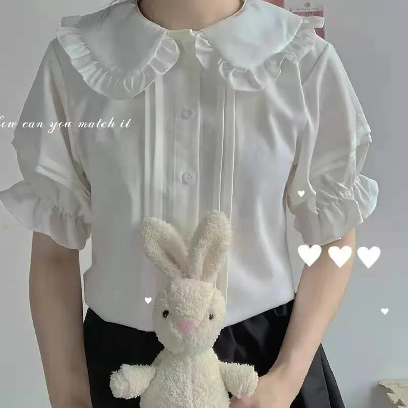 Camicette con colletto alla Peter Pan stile preppy Kawaii Camicette estive da donna con volant dolce Camicia bianca a maniche corte Ragazza Camicie Lolita giapponesi Jk