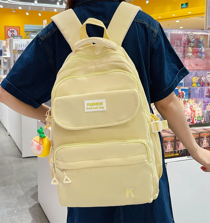 Mochila feminina mochila masculina alta escola estudante mochila ins pequeno fresco e simples estilo moda sacos de cor sólida