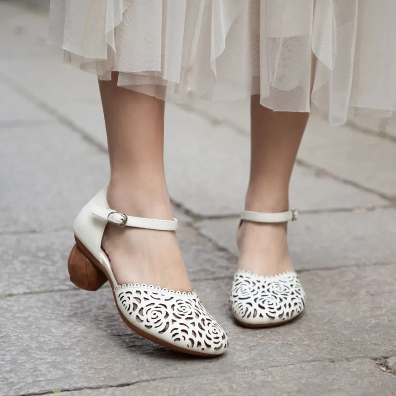 

Leather Sandals Spring and Summer New Round Head Retro Hollow Women's Shoes Middle Heel Non-slip Rubber Sole Mother Slip-on