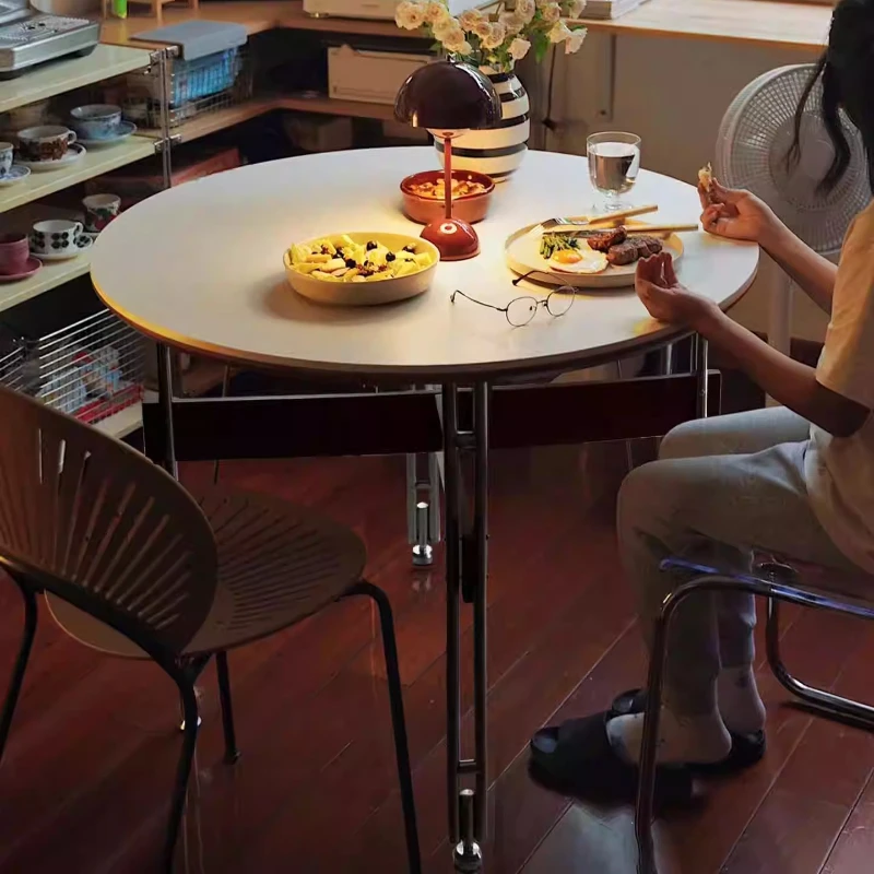 

Retro light luxury rock slab dining table solid wood medium and ancient style small apartment household French cream style