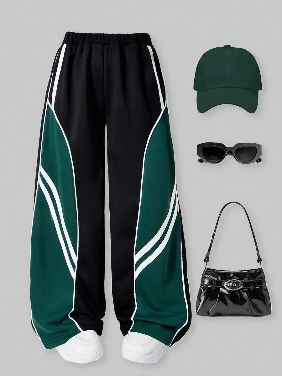 

Свободные спортивные брюки с широкими штанинами и контрастными полосками для девочек