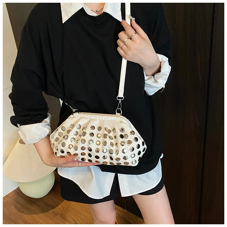 

European and American trend punk style messenger bag women 2025 high sense foreign style polka dot rivet shoulder shell bag