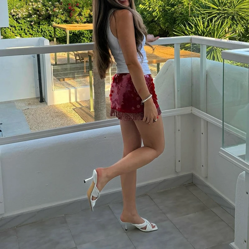 

Combhasaki Shiny Glitter Sequin Mini Skirt for Women Summer Sparkly Low Waist Tassel Hem Short Slim Pencil Skirts Party Clubwear