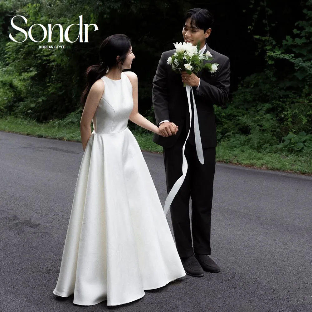 

Sondr O-Neck Sleeveless Satin Korean Wedding Dresses Floor-Length Bridal Gown Customized A Line Outdoor Photo Shoot Gown 2026