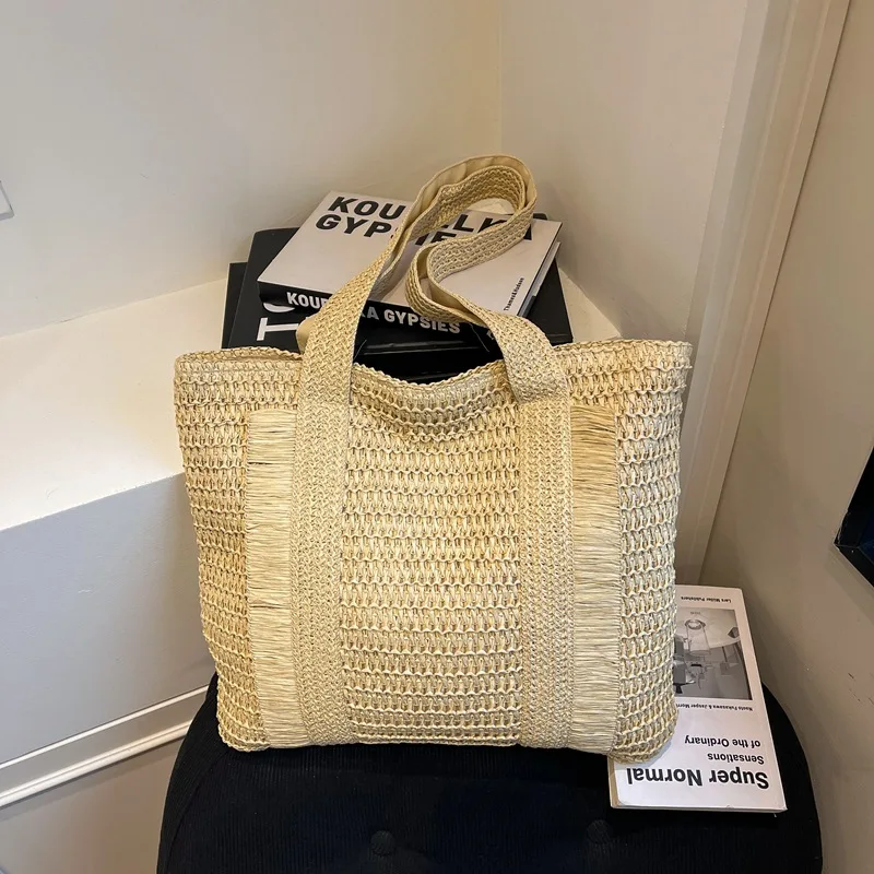 

Новые весенние плетеные сумки-тоут для женщин, вместительные, для пляжного отдыха, соломенные сумки для поездок на работу, модные и универсальные сумки через плечо.